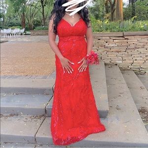 Long , red glitter print dress with corset.